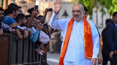 Union Home Minister Amit Shah cast his vote at a polling booth in Ahmedabad under the Gandhinagar Lok Sabha constituency in Gujarat on Tuesday. (Bloomberg) Union Home Minister Amit Shah cast his vote at a polling booth in Ahmedabad under the Gandhinagar Lok Sabha constituency in Gujarat on Tuesday. (Bloomberg)