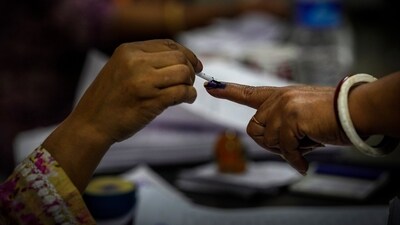 In this phase, more than 1,300 candidates, including around 120 women, are in the fray. (AP) In this phase, more than 1,300 candidates, including around 120 women, are in the fray. (AP)
