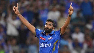 Mumbai Indians bowler Jasprit Bumrah is leading the Purple Cap race at the moment with 18 wickets in 12 matches. (PTI) Mumbai Indians bowler Jasprit Bumrah is leading the Purple Cap race at the moment with 18 wickets in 12 matches. (PTI)