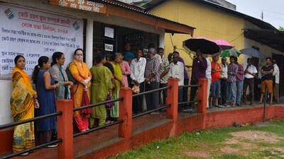 Voters wait to cast their vote for the third phase of Lok Sabha elections, in Guwahati. (PTI) Voters wait to cast their vote for the third phase of Lok Sabha elections, in Guwahati. (PTI)