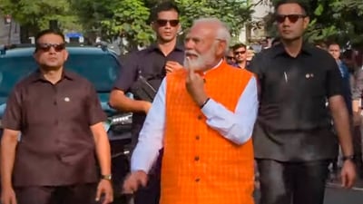 PM Narendra Modi shows his ink-marked finger after casting his vote for the third phase of Lok Sabha elections, in Ahmedabad. (PTI) PM Narendra Modi shows his ink-marked finger after casting his vote for the third phase of Lok Sabha elections, in Ahmedabad. (PTI)