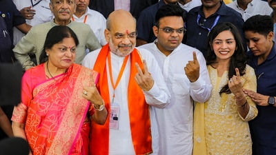 Union Home Minister Amit Shah was accompanied by wife Sonal Shah, son Jay Shah and daughter-in-law Rishita Patel. (PTI) Union Home Minister Amit Shah was accompanied by wife Sonal Shah, son Jay Shah and daughter-in-law Rishita Patel. (PTI)