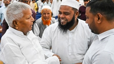 Patna: RJD chief Lalu Prasad Yadav being greeted by MLCs during their swearing-in ceremony, in Patna. (PTI) Patna: RJD chief Lalu Prasad Yadav being greeted by MLCs during their swearing-in ceremony, in Patna. (PTI)