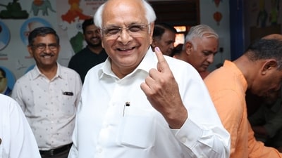 Gujarat Chief Minister Bhupendra Patel, and his son Anuj Patel cast their votes for the third phase of the Lok Sabha elections in Ahmedabad on Tuesday. Gujarat Chief Minister Bhupendra Patel, and his son Anuj Patel cast their votes for the third phase of the Lok Sabha elections in Ahmedabad on Tuesday.