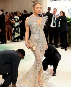 Jennifer Lopez dripped bling and sparkle in her 'almost see-through Schiaparelli dress that had 2.5 million silver beads (Instagram) Jennifer Lopez dripped bling and sparkle in her 'almost see-through Schiaparelli dress that had 2.5 million silver beads (Instagram)