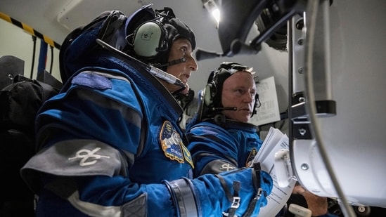 Boeing Crew Flight Test crew members Sunita Williams and Butch Wilmore work in the Boeing Starliner simulator at the Johnson Space Center in Houston on Nov. 3, 2022. The first flight of Boeing���s Starliner capsule with a crew on board is scheduled for Monday, May 6, 2024. (NASA/Robert Markowitz/PTI)(AP05_06_2024_000070A) (AP)