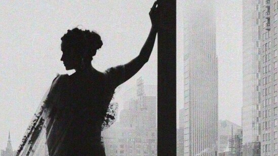 Alia Bhatt took to Instagram to share a black-and-white picture of her silhouette standing in front of a window looking out at the New York skyline in the backdrop. "Met set go," she captioned the post.&nbsp;