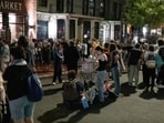 In this grab taken from video, protestors protesting the Israel-Hamas war stand outside near the campus of George Washington University, in Washington, Wednesday, May 8, 2024. Tensions have continued to ratchet up in standoffs with protesters on campuses across the U.S. and increasingly, in Europe, nearly three weeks into a movement launched by a protest at Columbia University. (WJLA via AP)