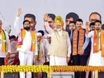 Prime Minister Narendra Modi with Maharashtra Chief Minister Eknath Shinde, Deputy Chief Minister Devendra Fadnavis and others in Kolhapur. (PTI)