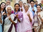 Pune, May 07 (ANI): Nationalist Congress Party (Sharadchandra Pawar) (NCP-SCP) candidate from Baramati seat Supriya Sule along with her mother Pratibha Pawar and other family members show their ink-marked fingers after casting their votes for the third phase of the Lok Sabha elections 2024, at Baramati in Pune on Tuesday. (ANI Photo) (Nitin Lawate)