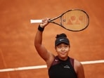 Japan's Naomi Osaka celebrates after winning her round of 128 match against France's Clara Burel