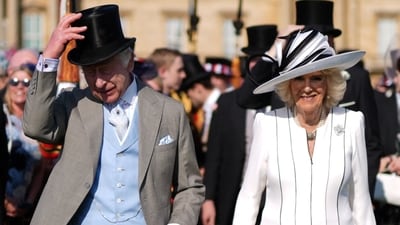 King Charles III and Queen Camilla attending a Royal Garden Party at Buckingham Palace, London. Picture date: Wednesday May 8, 2024. PA Photo. See PA story ROYAL Garden. Photo credit should read: Jordan Pettitt/PA Wire    Jordan Pettitt/Pool via REUTERS (via REUTERS)