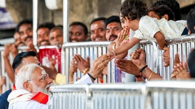 PM Narendra Modi greets devotees at the Raja Rajeshwara Swamy Temple, at Vemulawada in Karimnagar on Wednesday. (ANI) PM Narendra Modi greets devotees at the Raja Rajeshwara Swamy Temple, at Vemulawada in Karimnagar on Wednesday. (ANI)