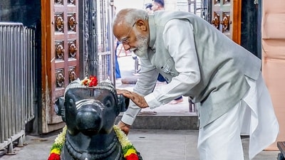 PM Narendra Modi performs rituals as he offers prayers at the Raja Rajeshwara Swamy Temple, at Vemulawada in Karimnagar. (ANI) PM Narendra Modi performs rituals as he offers prayers at the Raja Rajeshwara Swamy Temple, at Vemulawada in Karimnagar. (ANI)