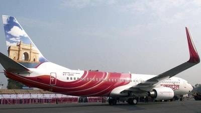 An Air India Express aircraft on the runway. (PTI File Photo) An Air India Express aircraft on the runway. (PTI File Photo)