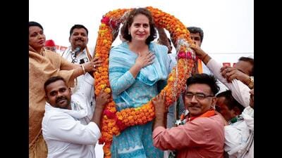 Congress General Secretary Priyanka Gandhi Vadra being garlanded by party leaders during the public meeting for the Lok Sabha Polls, in Raebareli on Wednesday. (ANI) Congress General Secretary Priyanka Gandhi Vadra being garlanded by party leaders during the public meeting for the Lok Sabha Polls, in Raebareli on Wednesday. (ANI)