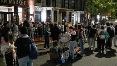 In this grab taken from video, protestors protesting the Israel-Hamas war stand outside near the campus of George Washington University, in Washington, Wednesday, May 8, 2024. Tensions have continued to ratchet up in standoffs with protesters on campuses across the U.S. and increasingly, in Europe, nearly three weeks into a movement launched by a protest at Columbia University. (WJLA via AP) (AP) In this grab taken from video, protestors protesting the Israel-Hamas war stand outside near the campus of George Washington University, in Washington, Wednesday, May 8, 2024. Tensions have continued to ratchet up in standoffs with protesters on campuses across the U.S. and increasingly, in Europe, nearly three weeks into a movement launched by a protest at Columbia University. (WJLA via AP) (AP)