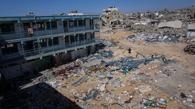 The remains of a United Nations Relief and Works Agency (UNRWA) school in central Khan Younis, Gaza, on Tuesday, May 7, 2024. International negotiators, including from the US, are at a delicate phase in talks to pause or end the seven-month war � a deal that would include the exchange of hostages for Palestinian prisoners and an increase of humanitarian aid to the embattled coastal strip.� Photographer: Ahmad Salem/Bloomberg (Bloomberg) The remains of a United Nations Relief and Works Agency (UNRWA) school in central Khan Younis, Gaza, on Tuesday, May 7, 2024. International negotiators, including from the US, are at a delicate phase in talks to pause or end the seven-month war � a deal that would include the exchange of hostages for Palestinian prisoners and an increase of humanitarian aid to the embattled coastal strip.� Photographer: Ahmad Salem/Bloomberg (Bloomberg)