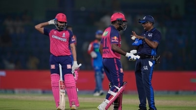 Sanju Samson talks to umpire after getting out during the Indian Premier League cricket match between Delhi Capitals and Rajasthan Royals (AP)