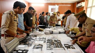 Police display the items seized from the gang on Wednesday, including over 120 passports, fake stamps and visa documents, besides 755 forged appointment letters. (Sunil Ghosh/HT Photo) Police display the items seized from the gang on Wednesday, including over 120 passports, fake stamps and visa documents, besides 755 forged appointment letters. (Sunil Ghosh/HT Photo)