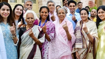 Pune, May 07 (ANI): Nationalist Congress Party (Sharadchandra Pawar) (NCP-SCP) candidate from Baramati seat Supriya Sule along with her mother Pratibha Pawar and other family members show their ink-marked fingers after casting their votes for the third phase of the Lok Sabha elections 2024, at Baramati in Pune on Tuesday. (ANI Photo) (Nitin Lawate) Pune, May 07 (ANI): Nationalist Congress Party (Sharadchandra Pawar) (NCP-SCP) candidate from Baramati seat Supriya Sule along with her mother Pratibha Pawar and other family members show their ink-marked fingers after casting their votes for the third phase of the Lok Sabha elections 2024, at Baramati in Pune on Tuesday. (ANI Photo) (Nitin Lawate)