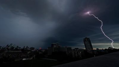 Lightning strikes in the distance as a thunderstorm passes over downtown Kansas City, Mo., July 30, 2023. Tens of millions of Americans stretching from Lincoln, Neb., to Baltimore could face strong thunderstorms Monday night, April 15, 2024, through Wednesday, April 17, with tornadoes possible in some states. (AP Photo/Charlie Riedel, File) (AP) Lightning strikes in the distance as a thunderstorm passes over downtown Kansas City, Mo., July 30, 2023. Tens of millions of Americans stretching from Lincoln, Neb., to Baltimore could face strong thunderstorms Monday night, April 15, 2024, through Wednesday, April 17, with tornadoes possible in some states. (AP Photo/Charlie Riedel, File) (AP)