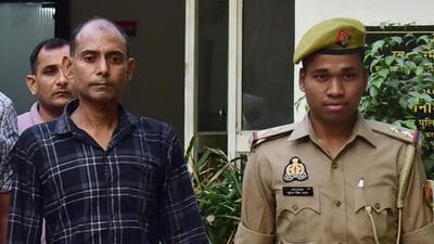Suspect 45-year-old Dharmendra Kumar in police custody in Ghaziabad, on Wednesday. (Sakib Ali /Hindustan Times) Suspect 45-year-old Dharmendra Kumar in police custody in Ghaziabad, on Wednesday. (Sakib Ali /Hindustan Times)