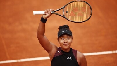 Japan's Naomi Osaka celebrates after winning her round of 128 match against France's Clara Burel (REUTERS)
