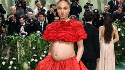 Adwoa Aboah's Bold Pregnancy Announcement: Adwoa Aboah made a bold statement by announcing her pregnancy in a striking red H&M skirt set, embracing her journey into motherhood with a fashion-forward and empowering look. (AFP) Adwoa Aboah's Bold Pregnancy Announcement: Adwoa Aboah made a bold statement by announcing her pregnancy in a striking red H&M skirt set, embracing her journey into motherhood with a fashion-forward and empowering look. (AFP)