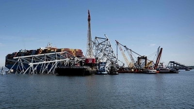 Explosives will be detonated to free cargo ship Dali from Francis Scott Key Bridge’s wreckage (Photo by Brendan Smialowski / AFP) (AFP) Explosives will be detonated to free cargo ship Dali from Francis Scott Key Bridge’s wreckage (Photo by Brendan Smialowski / AFP) (AFP)