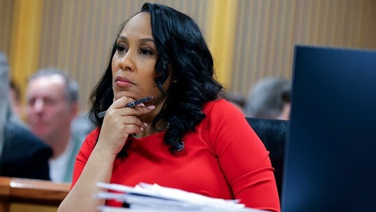 FILE - Fulton County District Attorney Fani Willis looks on during a hearing on the Georgia election interference case, Friday, March, 1, 2024, in Atlanta. An attorney for Donald Trump says he’s optimistic an appellate review will lead to the Georgia 2020 election interference case against him being dismissed and Fulton County District Attorney Fani Willis being disqualified. (AP Photo/Alex Slitz, Pool, File) (AP)