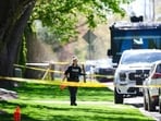 Toronto police patrol outside the home of Canadian rapper Drake after reports of a shooting early on May 7, 2023, according to media reports. (Photo by Christopher  Katsarov Luna / AFP)