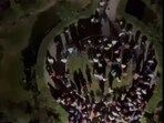 A huge crowd protested against those who feed stray dogs and attacked the couple — Shubham and Sankalita. They also assaulted police officials. (Screengrab)