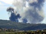 Smoke plumes billow from the site of an Israeli airstrike on the outskirts of the village of Marwahin in southern Lebanon near the border with Israel. (AFP) Smoke plumes billow from the site of an Israeli airstrike on the outskirts of the village of Marwahin in southern Lebanon near the border with Israel. (AFP)