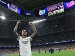 Real Madrid's Spanish forward #14 Joselu celebrates victory