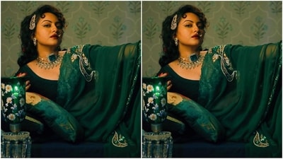 In terms of accessories, she chose traditional jewellery including paasa maang tikka, an elegant nose ring, a choker necklace with an oversized green emerald and a necklace studded with diamonds and green stones that exuded royal vibes, Lastly, she chose green bangles that adorned her wrist and perfectly complemented her look. (Instagram/@aslisona) In terms of accessories, she chose traditional jewellery including paasa maang tikka, an elegant nose ring, a choker necklace with an oversized green emerald and a necklace studded with diamonds and green stones that exuded royal vibes, Lastly, she chose green bangles that adorned her wrist and perfectly complemented her look. (Instagram/@aslisona)