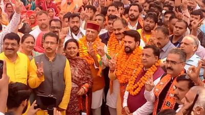 BJP’s Kutlehar assembly bypoll candidate Devender Bhutto, Union minister and candidate for the Hamirpur Lok Sabha seat Anurag Thakur, and BJP state chief Rajeev Bindal, (HT) BJP’s Kutlehar assembly bypoll candidate Devender Bhutto, Union minister and candidate for the Hamirpur Lok Sabha seat Anurag Thakur, and BJP state chief Rajeev Bindal, (HT)