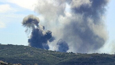 Smoke plumes billow from the site of an Israeli airstrike on the outskirts of the village of Marwahin in southern Lebanon near the border with Israel. (AFP)