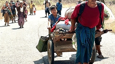 In this photo released by the Free Burma Rangers, people flee Myanmar military in Pasaung, Karenni state, Myanmar on March 1, 2024.- Representative Image (Free Burma Rangers via AP) (AP) In this photo released by the Free Burma Rangers, people flee Myanmar military in Pasaung, Karenni state, Myanmar on March 1, 2024.- Representative Image (Free Burma Rangers via AP) (AP)