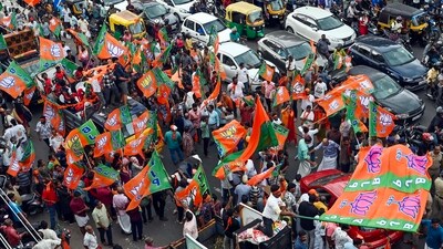 Thiruvananthapuram: BJP supporters wave the party flags during a roadshow ahead of the second phase of Lok Sabha elections, in Thiruvananthapuram, Wednesday, April 24, 2024. (PTI Photo) (PTI04_24_2024_000275B) (PTI) Thiruvananthapuram: BJP supporters wave the party flags during a roadshow ahead of the second phase of Lok Sabha elections, in Thiruvananthapuram, Wednesday, April 24, 2024. (PTI Photo) (PTI04_24_2024_000275B) (PTI)
