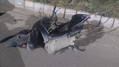 The mangled remains of one of the victims’ scooter that was hit by a speeding car in Kharar on Thursday. (HT Photo) The mangled remains of one of the victims’ scooter that was hit by a speeding car in Kharar on Thursday. (HT Photo)