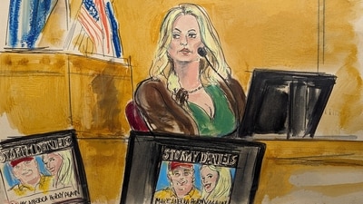 Stormy Daniels testifies on the witness stand as a promotional image for one of her shows featuring an image of Trump is displayed on monitors in Manhattan criminal court, Thursday, May 9, 2024, in New York. (Elizabeth Williams via AP) (AP) Stormy Daniels testifies on the witness stand as a promotional image for one of her shows featuring an image of Trump is displayed on monitors in Manhattan criminal court, Thursday, May 9, 2024, in New York. (Elizabeth Williams via AP) (AP)