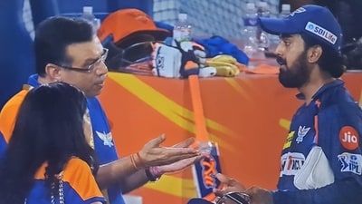 Sanjiv Goenka (L) in an animated chat with KL Rahul (X) Sanjiv Goenka (L) in an animated chat with KL Rahul (X)