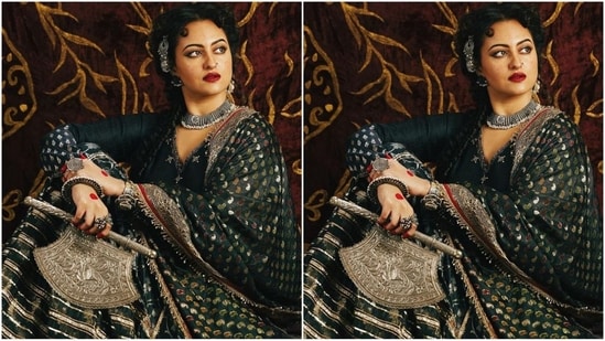 For her next look, Sonakshi was dressed in a dark green sharara ensemble with a full-sleeved V-neck kurta.  She paired it with Sharara pants that had intricate golden sequin work on them, radiating glamour.  With a golden border and matching dupatta with polka dots, her outfit is a true work of art.(Instagram/@aslisona)