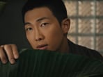 BTS RM in a still from the music video of Come Back to Me.