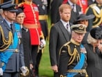 King Charles III, front right, Camilla, the Queen Consort, Prince Harry and Prince William watch as the coffin of Queen Elizabeth II is placed into the hearse following the state funeral service in Westminster Abbey in central London Monday Sept. 19, 2022. King Charles III has been diagnosed with a form of cancer and has begun treatment, Buckingham Palace says on Monday, Feb. 5, 2024. (AP Photo/Martin Meissner, Pool, File) King Charles III, front right, Camilla, the Queen Consort, Prince Harry and Prince William watch as the coffin of Queen Elizabeth II is placed into the hearse following the state funeral service in Westminster Abbey in central London Monday Sept. 19, 2022. King Charles III has been diagnosed with a form of cancer and has begun treatment, Buckingham Palace says on Monday, Feb. 5, 2024. (AP Photo/Martin Meissner, Pool, File)