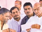 Nilesh Lanke with Sharad Pawar during a rally in Shevgaon on April 28.