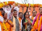 Assam chief minister and BJP leader Himanta Biswa Sarma being garlanded during an election campaign rally. 