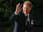 TOPSHOT - Britain's Prince Harry, Duke of Sussex waves as he arrives to attend a ceremony marking the 10th anniversary of the Invictus Games, at St Paul's Cathedral in central London, on May 8, 2024. (Photo by JUSTIN TALLIS / AFP)