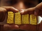 Akshaya Tritiya 2024: A salesman displays gold bars inside a jewellery shop on the occasion of the Akshaya Tritiya festival in Hyderabad.